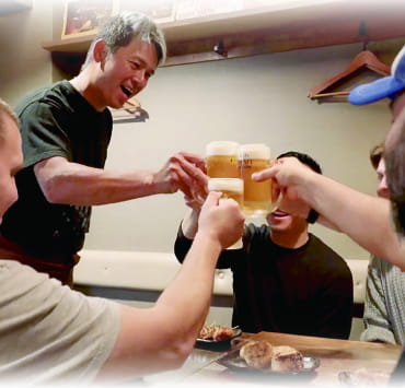 Guests enjoying a yakitori party