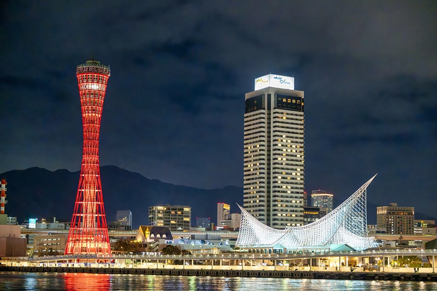 Kobe Port Tower and waterfront skyline at night in Kobe, Japan
