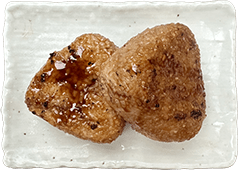 Japanese grilled rice ball served with yakitori in Kobe, Japan